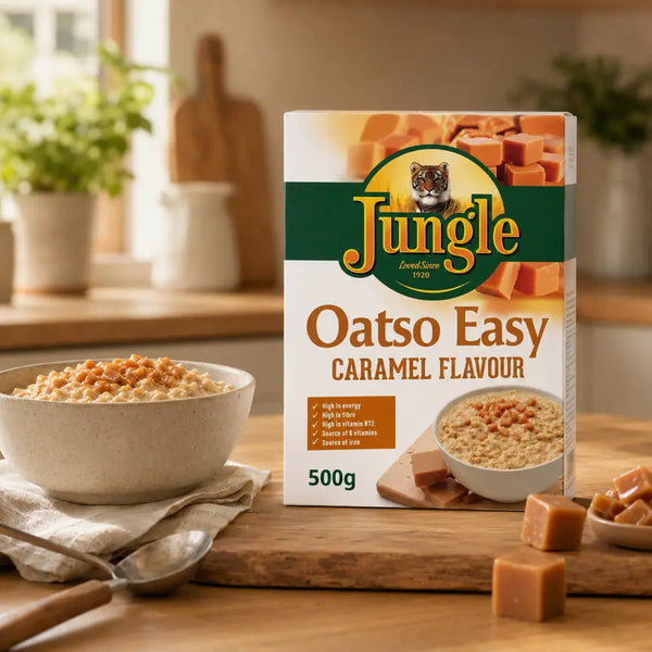 Jungle Oatso Easy Caramel 500g beside a warm bowl of caramel oats in a sunlit kitchen