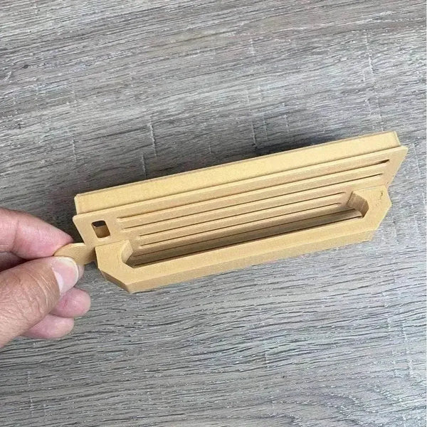 Medium gold plastic Koeksister Cutter for shaping traditional fried dough pastries