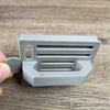 Small grey plastic Koeksister cutter for traditional braided fried dough pastry