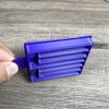 Purple small plastic koeksister cutter for traditional braided dough pastries
