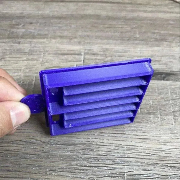 Purple small plastic koeksister cutter for traditional braided dough pastries