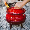 LK Three Legged Potjie Pot 7.8L red enamel cast iron with lid and handle for fire, gas, oven, and induction cooking