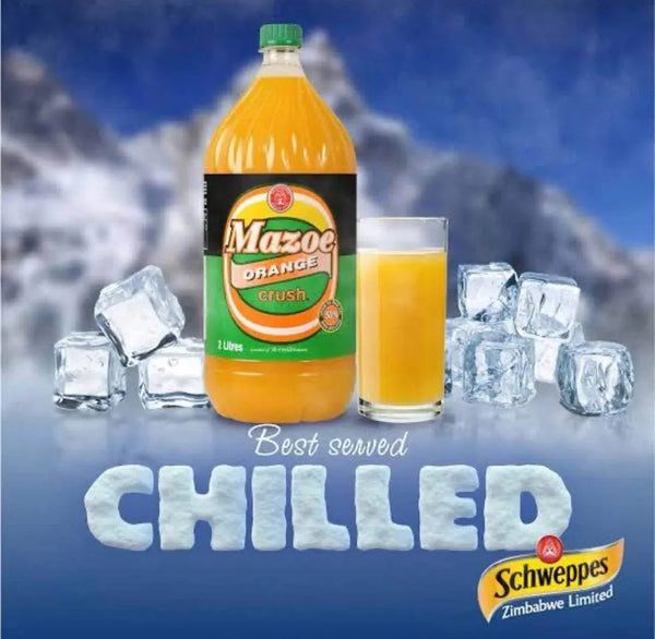 Mazoe Orange Crush 2 Litre bottle with glass, surrounded by ice cubes, perfect for chilling.