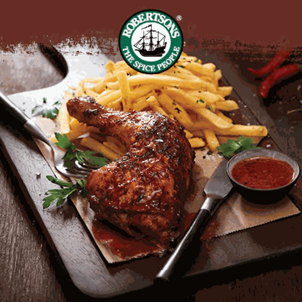 Delicious chicken seasoned with Robertsons Chicken Spice, served with fries and sauce.