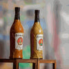 Rooibaard Groen Trui Chilli Sauce 550ml bottle on display.