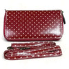 Red sling wallet with small dots and removable shoulder strap
