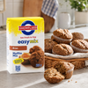 Snowflake Bran Muffin Mix 500g beside a basket of freshly baked bran muffins
