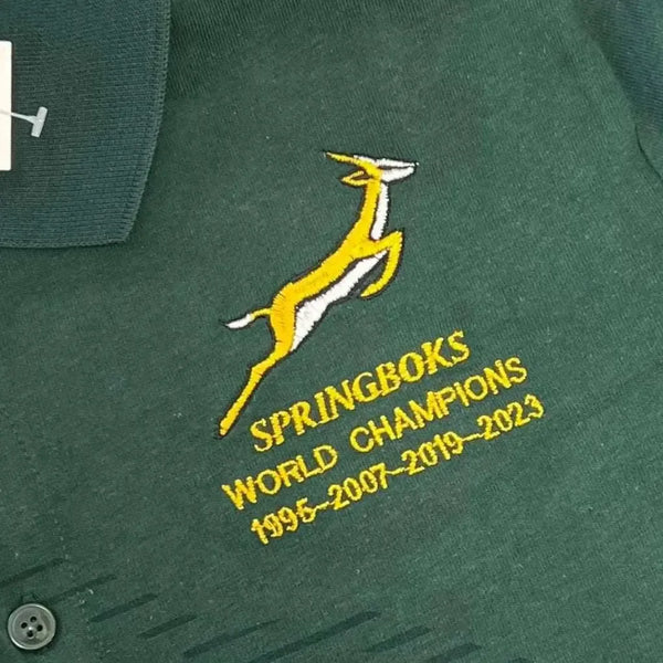 Green Springbok Official Licensed Supporter T-Shirt with yellow logo and "World Champions 1995-2007-2019-2023" embroidery