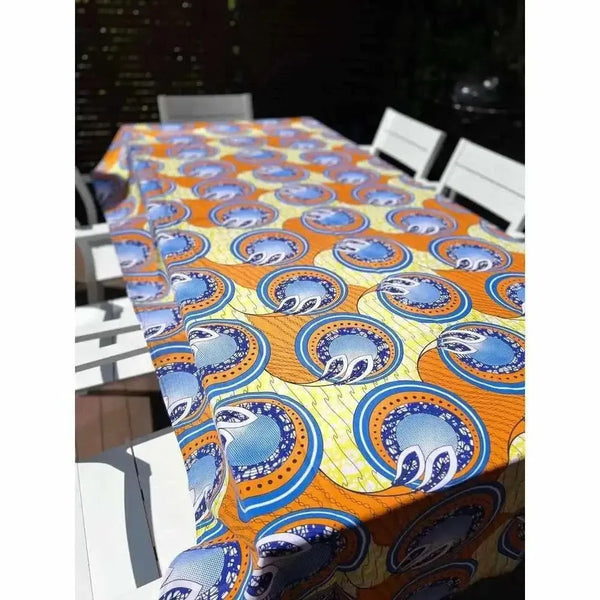 Orange blue and lime tablecloth with geometric shapes 275cm by 140cm