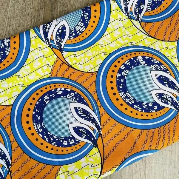 Orange, blue, and lime tablecloth with geometric shapes, 275cm by 140cm