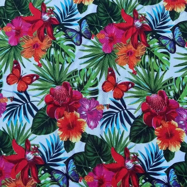 White tablecloth with tropical flower design on dining table