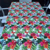 White tablecloth with tropical flower design on dining table