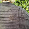 Black knitted Winter Poncho with round neck by Cotton Road