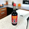 Maggi Lazenby Worcestershire Sauce 500ml bottle on kitchen counter.