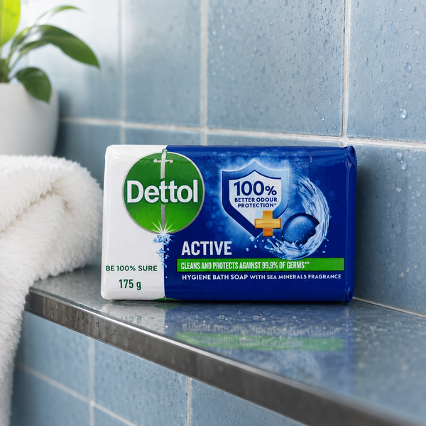 Dettol Active Bath Soap 175g on blue tiled shower shelf