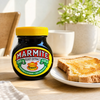 Marmite Yeast Extract 250g jar beside buttered toast