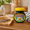 Marmite Yeast Extract 250g jar with Marmite spread thinly on toast