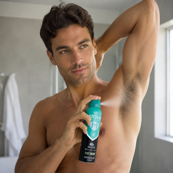 Man using Mitchum Men Invisible Pure Energy 150ml after showering